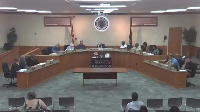 Redevelopment commission okays 9 squad cars and approves engineering supplement; council informed of property disposition steps