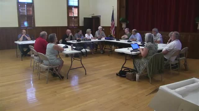 Board flags paving trucks near wetlands; asks code enforcement to check