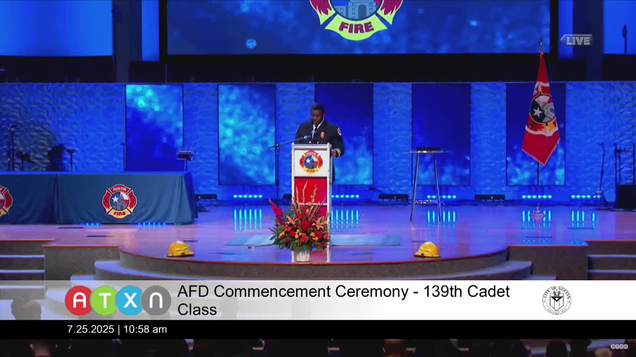 Retired Navy Seal Roark Denver congratulates Austin Fire Department cadets