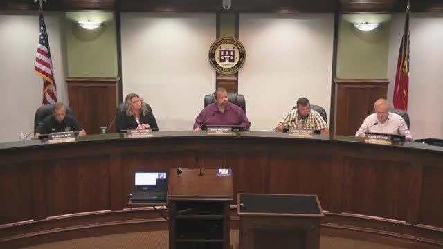 Council denies front/rear yard setback variance; staff said no hardship justified relief