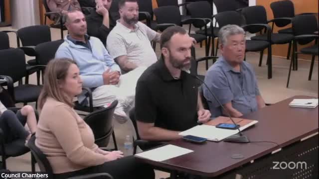 City Board Evaluates Height and Privacy Concerns for Proposed Residential Decks