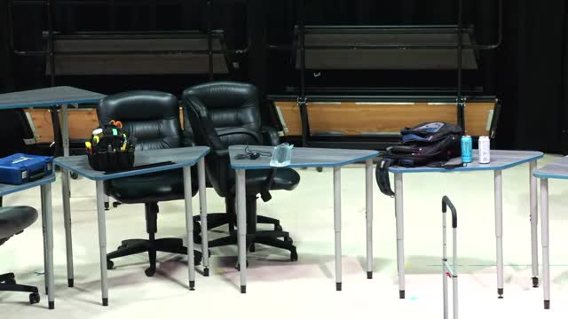Audio Technicians Optimize Sound Levels at Local Middle School Event