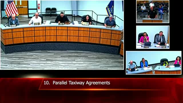 Commission authorizes signing for FAA-funded parallel taxiway; city share $317,650