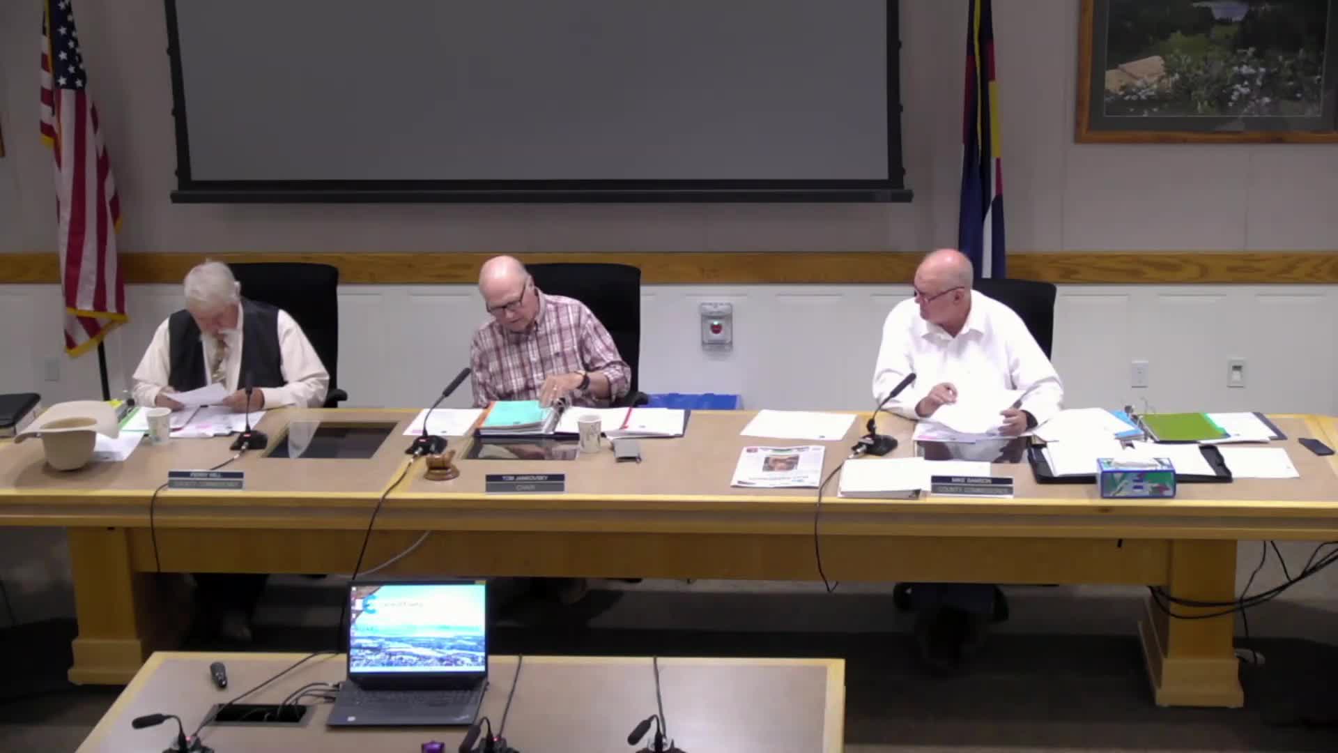 Garfield County enacts temporary hiring freeze amid $9 million property‑tax shortfall; commissioners approve a bundle of permits, donations and intergovernmenta