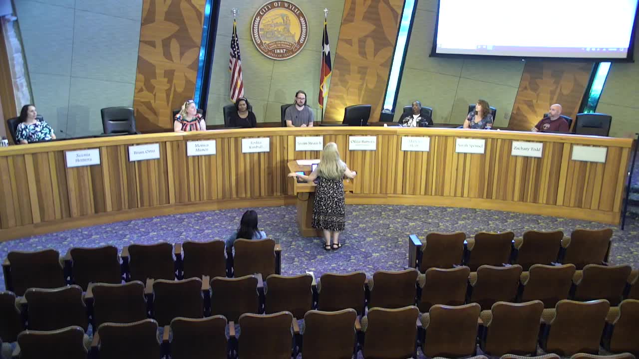 Library Updates Collection Policy and Addresses Budget Cuts in Meeting