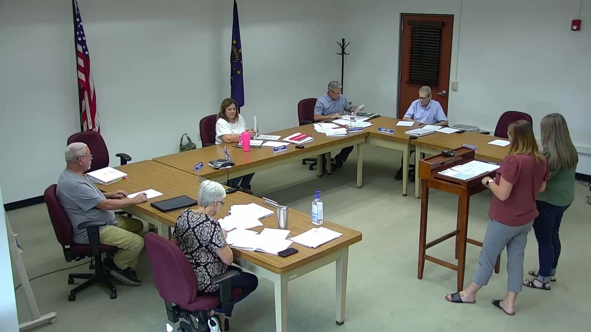 Commissioners authorize advertising for county financial‑software procurement after lengthy review