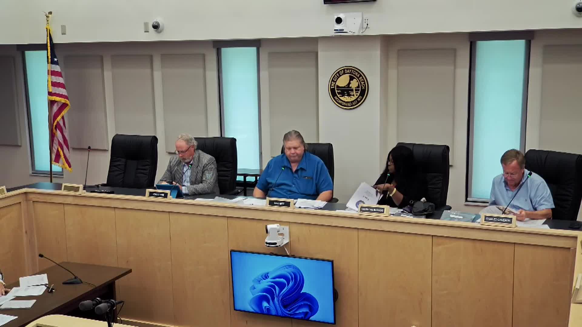 Board approves after‑the‑fact carport variance at 1007 Cadillac Drive