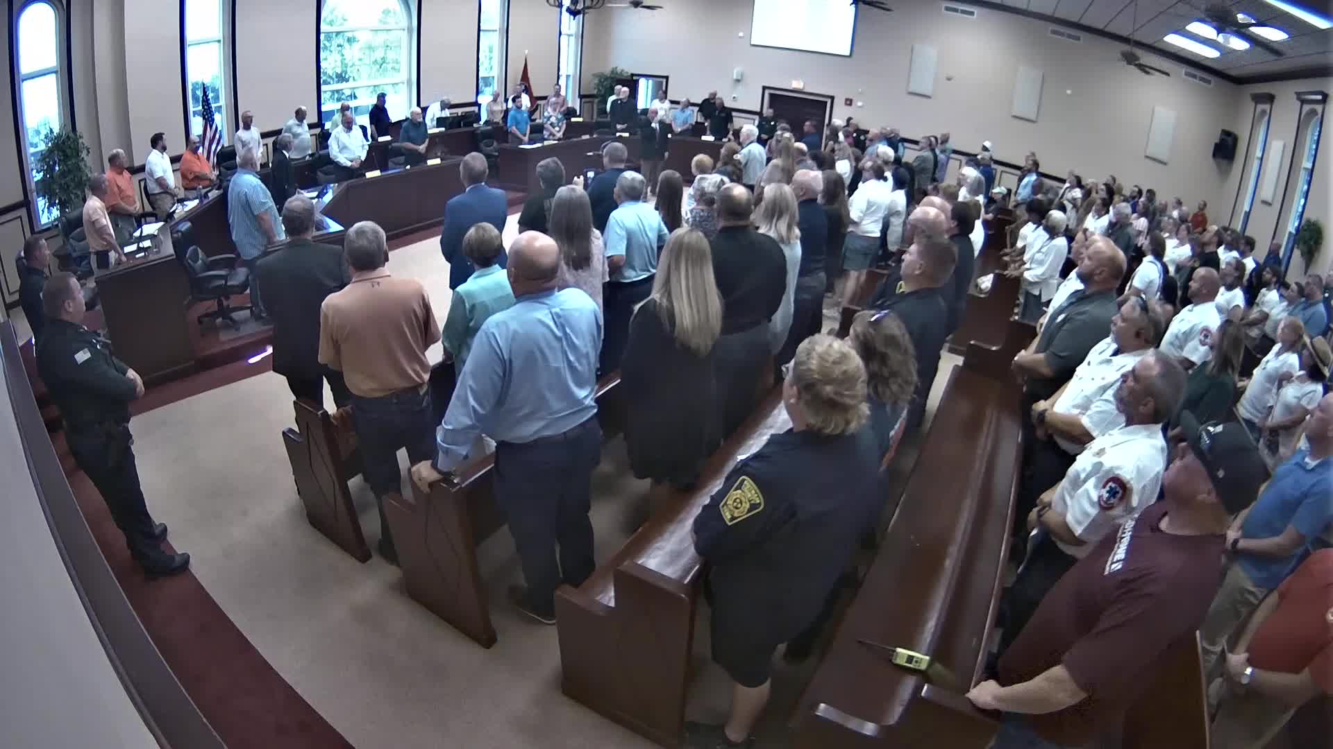 District 11 Invokes Prayer and Confirms Quorum at Meeting
