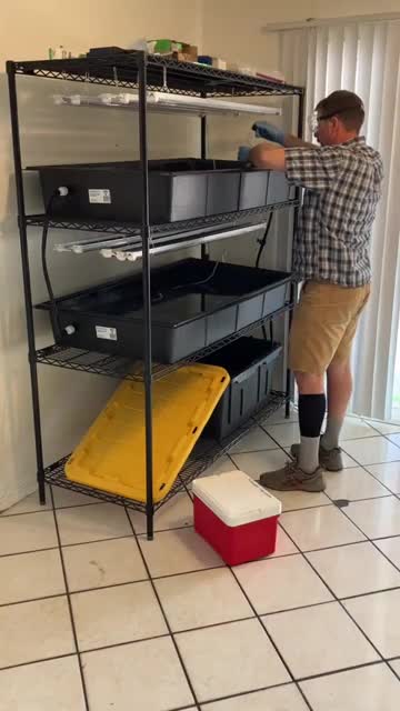 Resident says hard tap water can make granular fertilizer precipitate; recommends liquid fertilizers