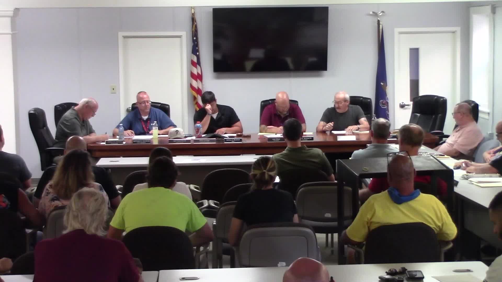 Council approves four‑year tax-collection arrangement after debate over pay, workload and shared costs