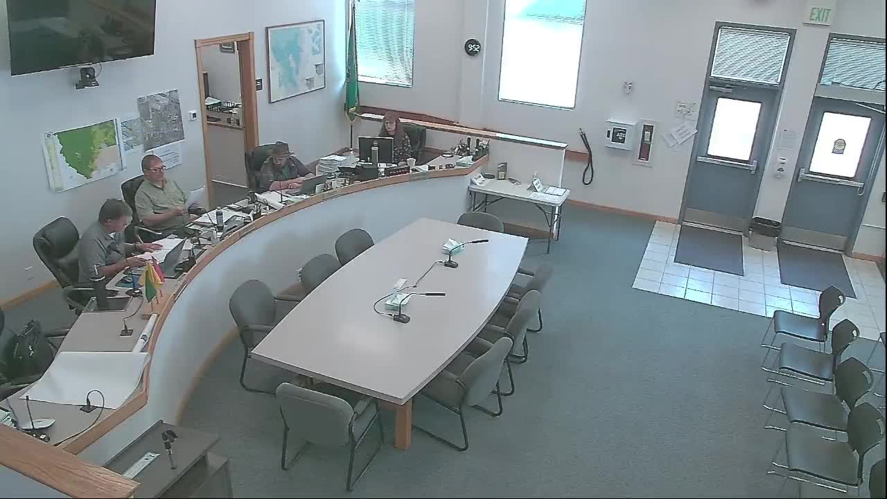 Commissioners adopt budget amendment adjusting beginning fund balance and reallocating contingency to staffing