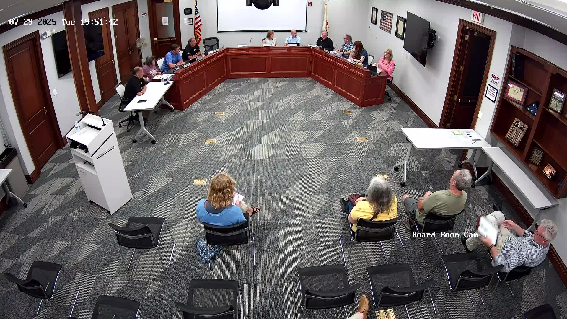 Trustees review building‑code permit updates; committee moves item for later action