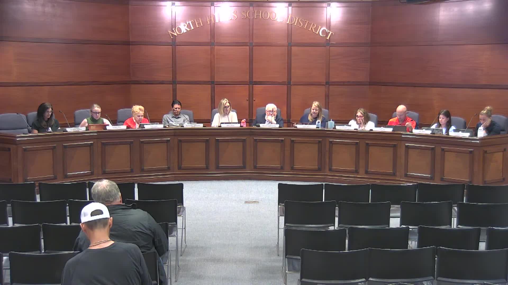 Board reviews conflict-of-interest policy language; members ask for clearer honorarium and discipline provisions