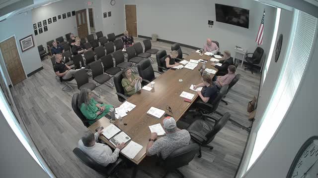 Law director explains tax‑sale proceeds go to county, not retained personally; work shifted in‑house