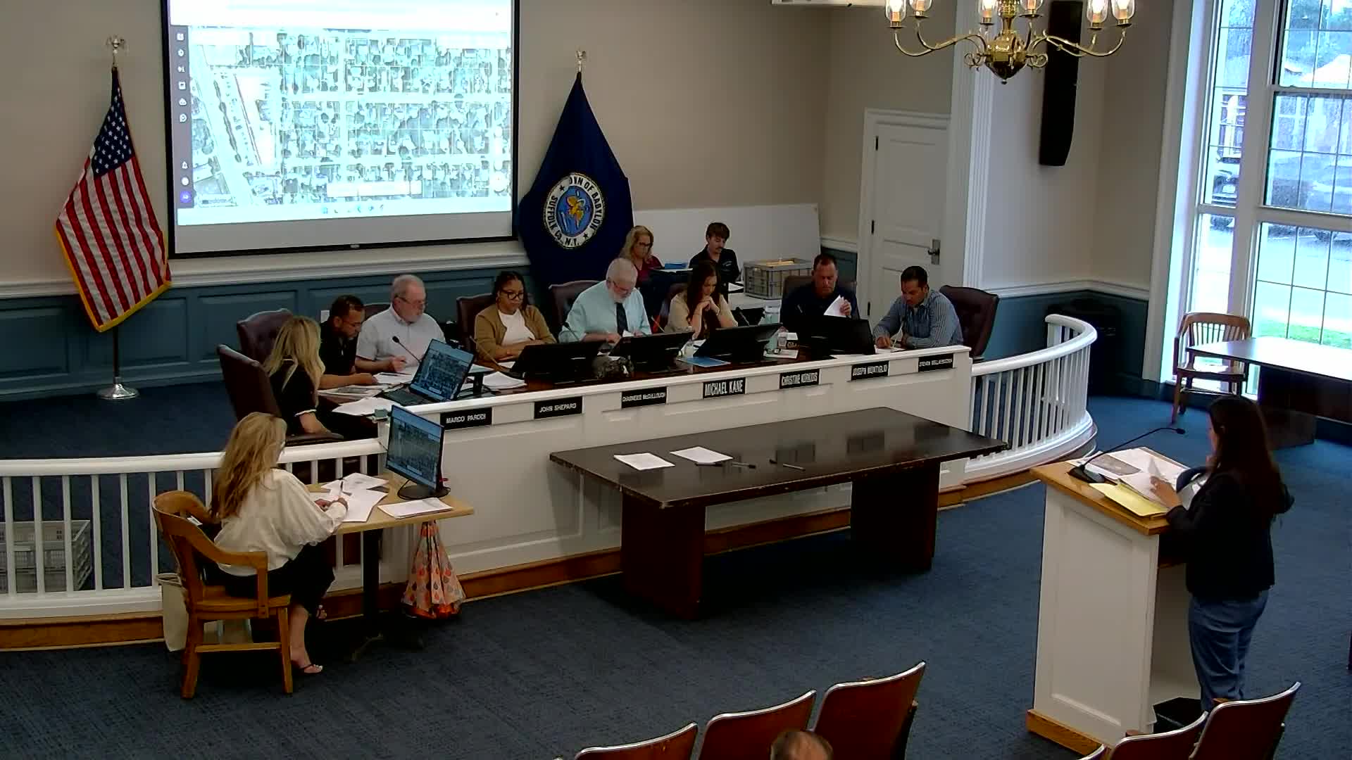 Two‑lot subdivision in Amityville: board keeps record open, reserves decision