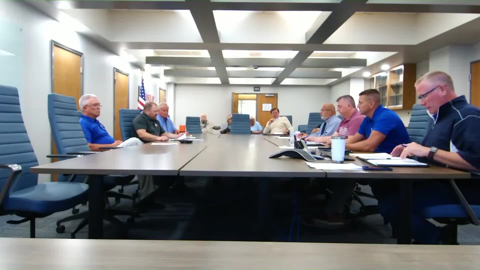 Committee directs ordinance change for cul-de-sac sidewalks, discusses city cost‑share program