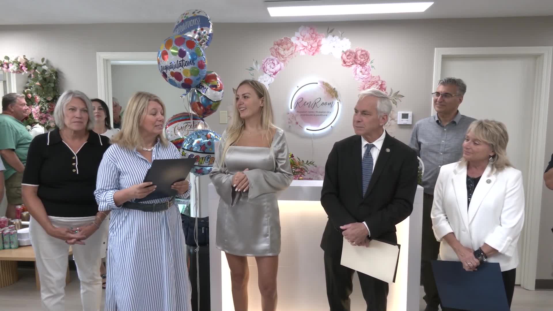 Mayor Welcomes New Business with Council Members in Medina