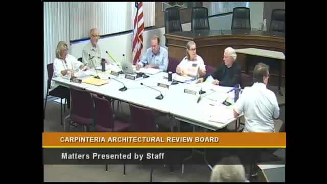 Architectural board offers informal comments on front-entry and color revisions for 5557 Ky Arena residence