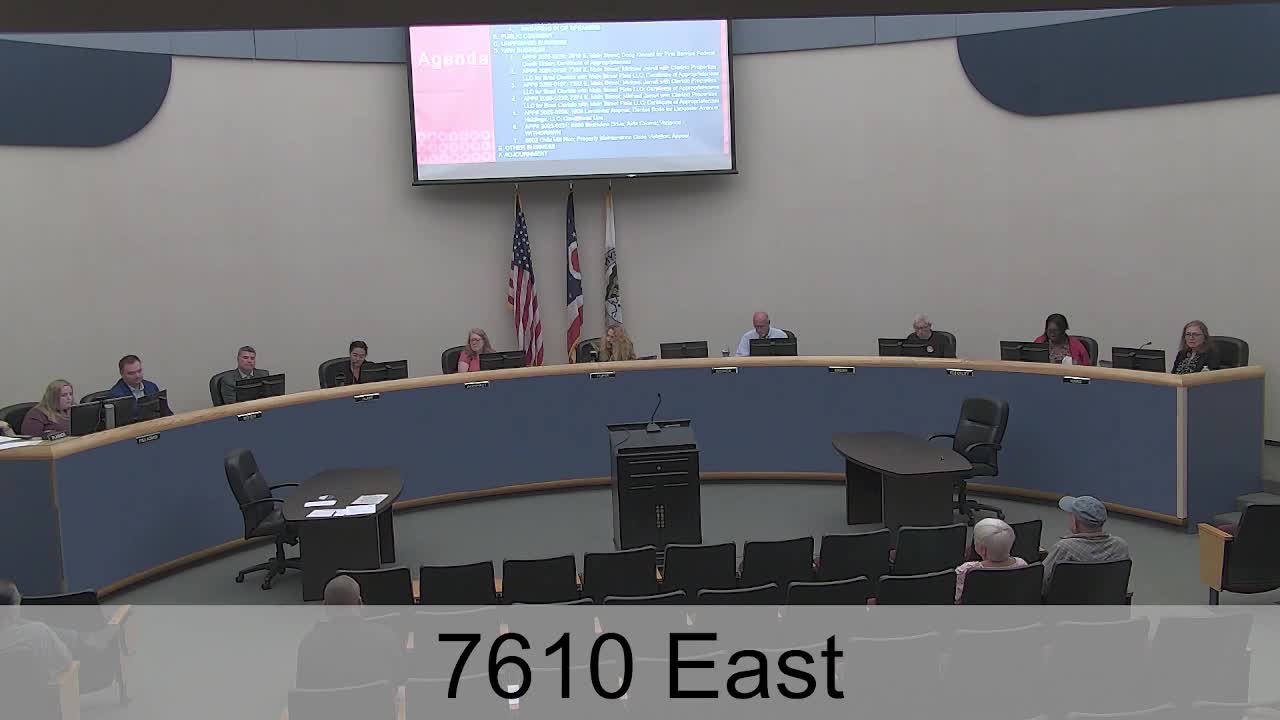 Planning board approves white vinyl siding for First Service branch at 7610 East Main Street