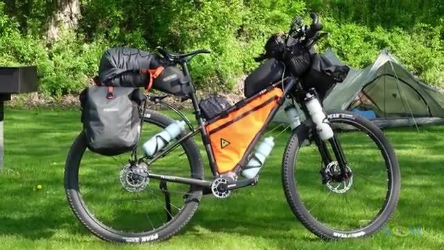 Cyclist Explains Benefits of Low Gear and Lightweight Camping on Erie Canal Tour