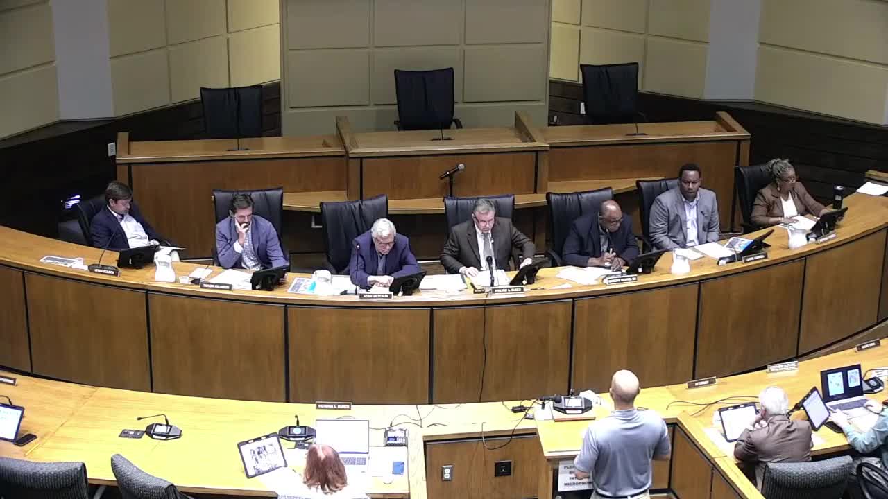 Board allows contractor storage at 3050 Old Shell Road with fence and vegetated buffer conditions