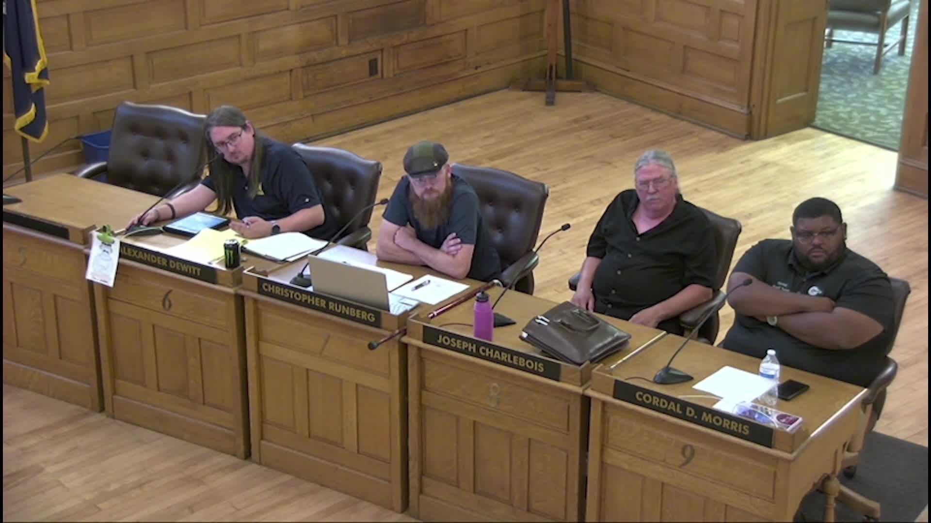 Commissioners Discuss No-Knock Raid Policies and Body Camera Regulations at City Meeting