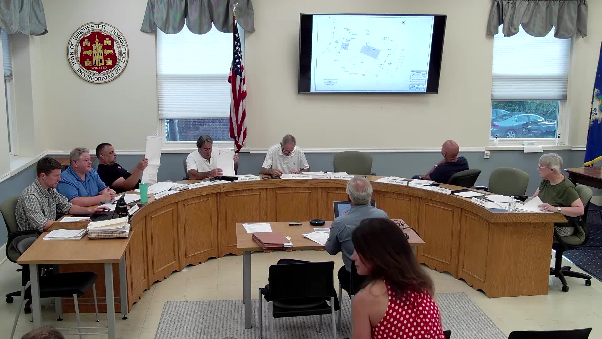 Commission accepts application for reconfiguration at 734 Lake Drive; applicant reduces impervious area