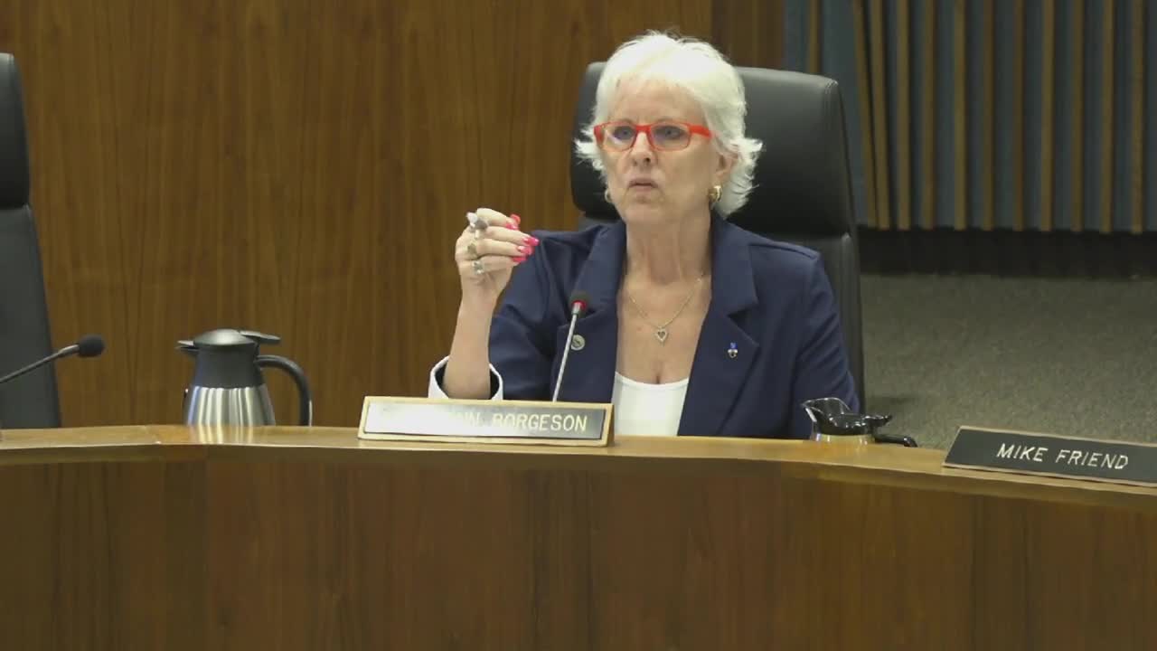 Pharmacist David Cole Protests Property Valuation at Q Street Board Meeting