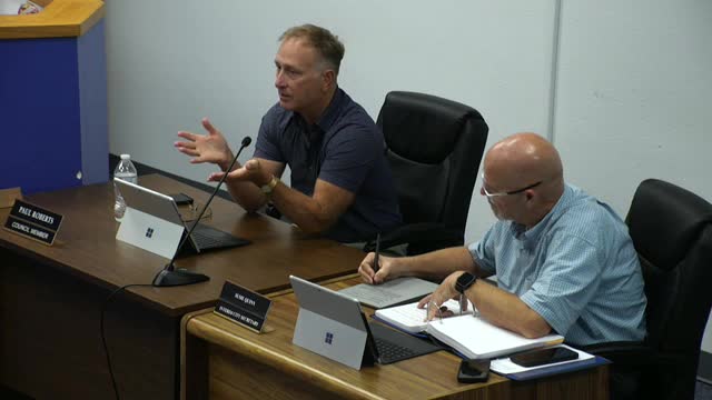 Commissioner Challenges Height Variance Rationale at City Council Meeting