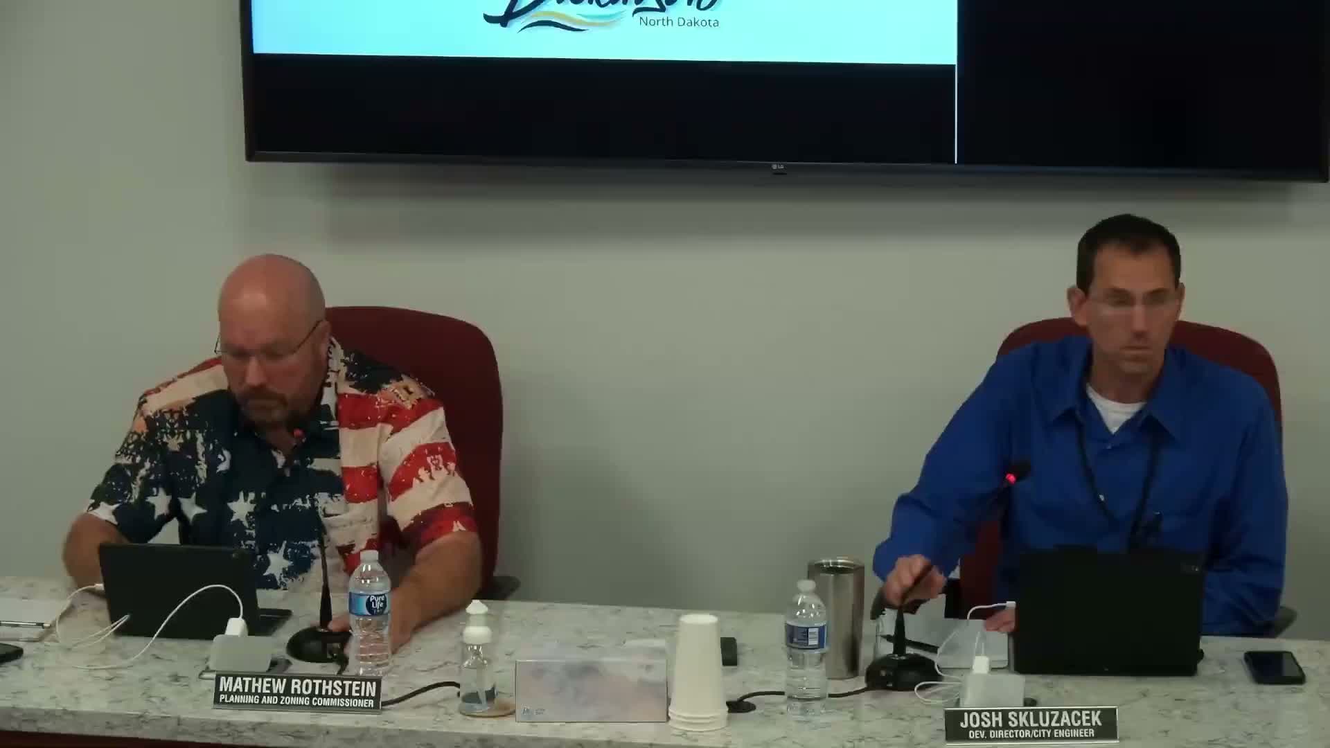 Staff proposes replacing special‑use permit for oil wells with public‑hearing resolution to align with NDIC jurisdiction