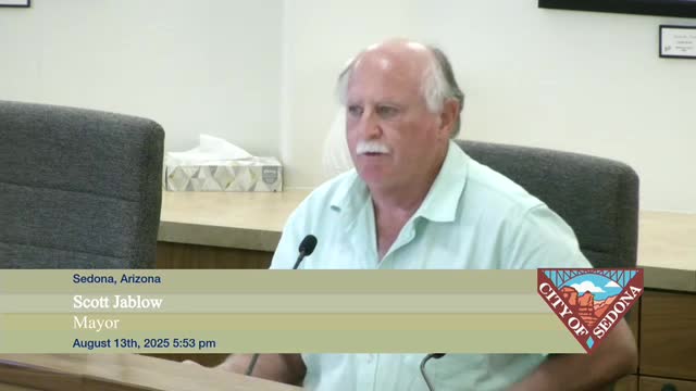 Commander Kozak outlines evacuation levels during emergency meeting