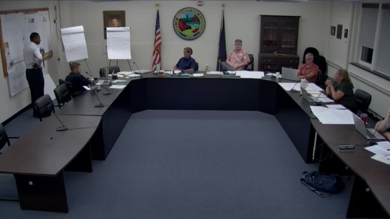 Town Council Debates Southern New Hampshire University Access and Development Options