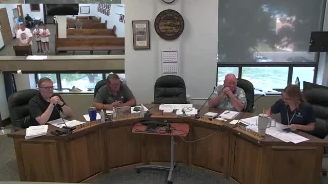 Girard Warriors coach reports national finishes and All-American placings to county commission