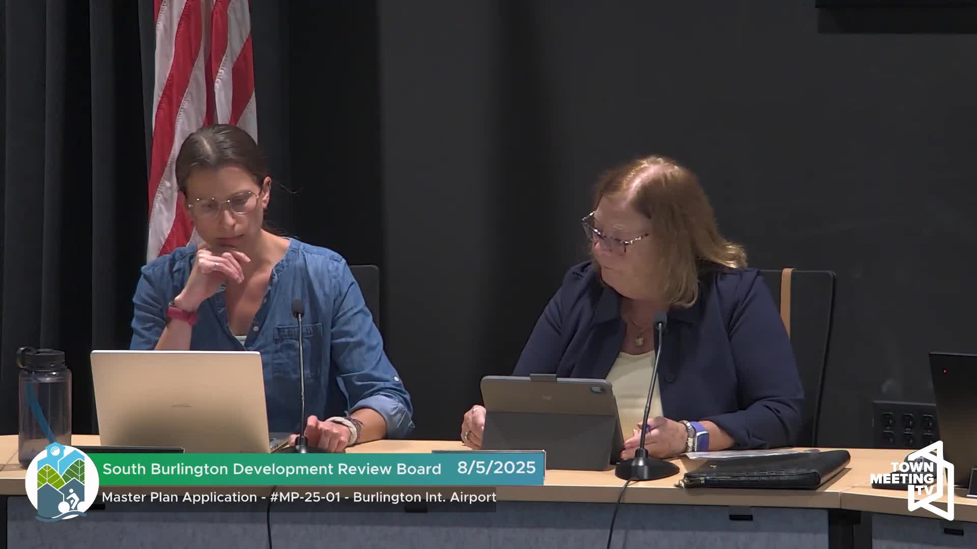 South Burlington Approves Airport Hangar Construction Plans Amid Public Meeting Disruptions