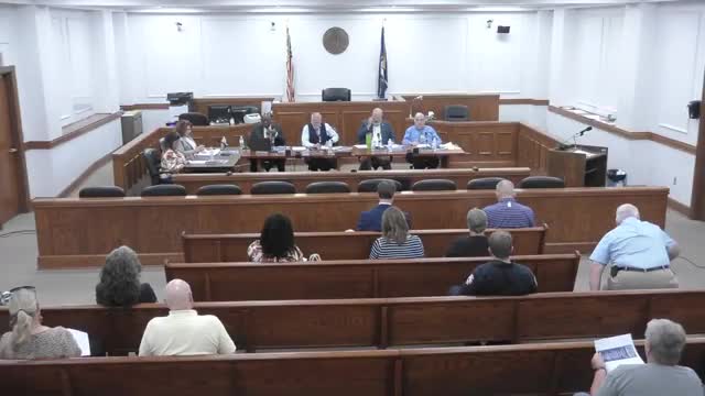 Fiscal court approves scoreboards, prequalifies convention‑center contractor and signs multiple change orders and resolutions