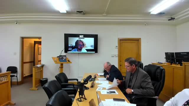 Commission debates sanitation-billing trigger; agrees to monitor occupancy-letter approach