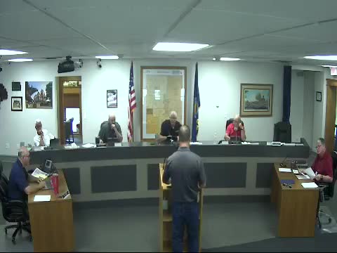 Commission approves bids solicitation for maintenance-shop fence and district-court remodel; pays crane invoice