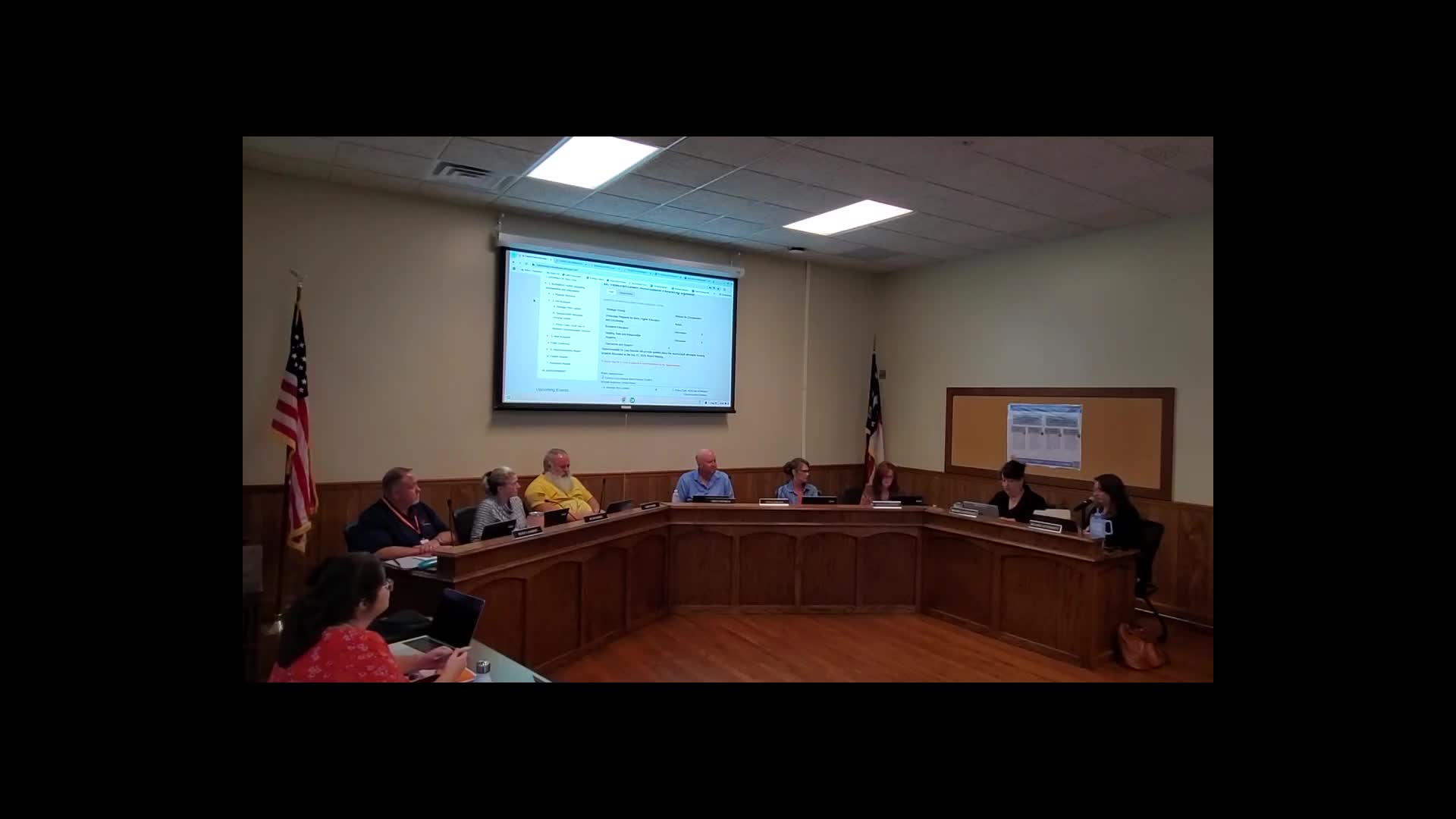 Courtney Owen presents mental health initiatives and partnerships to TransUnion County Schools Board