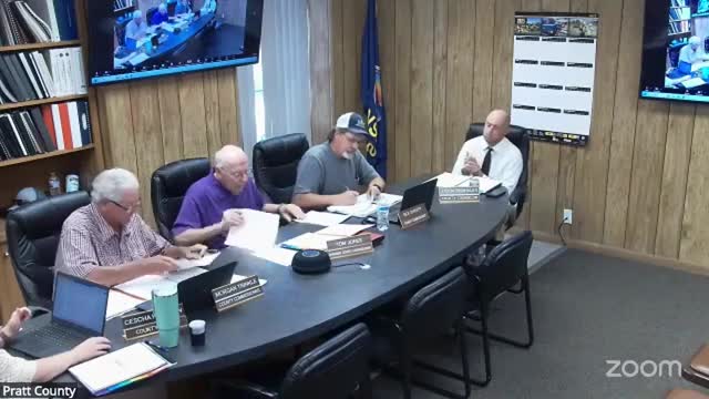 County reports 9-1-1 dispatch funding questions and chaotic helicopter calls; commission authorizes EMS EIG grant application