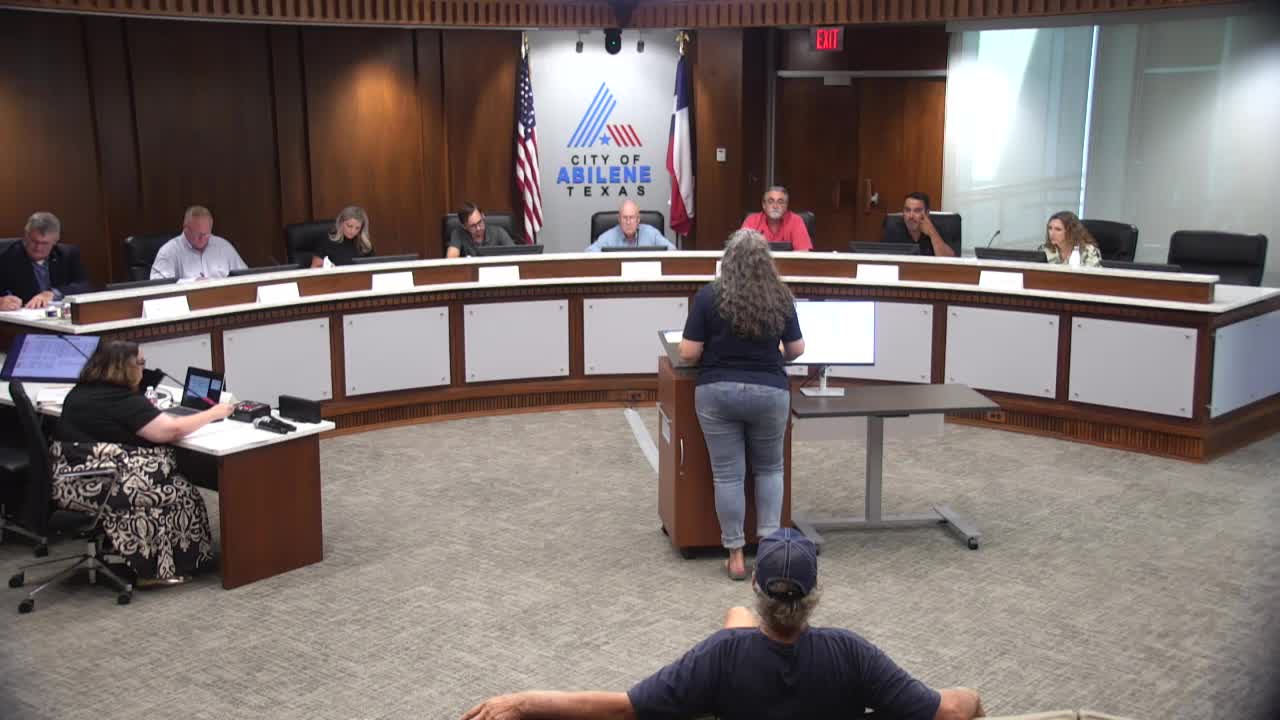 Community Member Advocates for Improved Street Repair Oversight in Texas Meeting