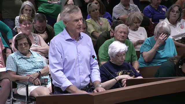 Kay Keith shares insights on city budgets and infrastructure at Mary's Creek rally