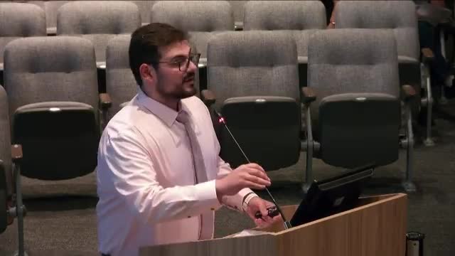 Staff raises safety, circulation and design concerns for Val Vista/Queen Creek shopping‑center update; developer submits revised layout