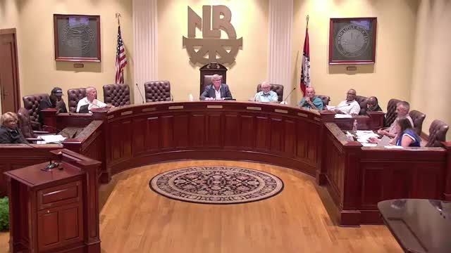 Commission approves tire‑store conditional use at 1601 East Broadway; storage rules and container limits clarified