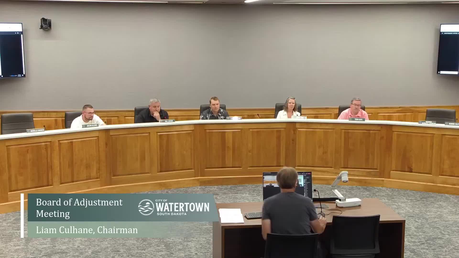 Resident asks for variance to build 240‑sq‑ft accessory structure at 824 Second St. NE; commission debates ordinance limit