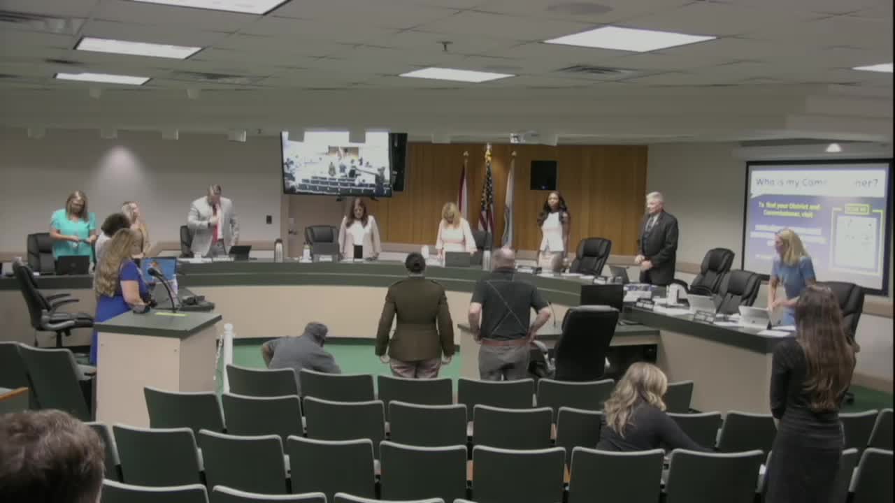 Colonel Christie Perry leads Pledge of Allegiance at Clay County Commissioners meeting