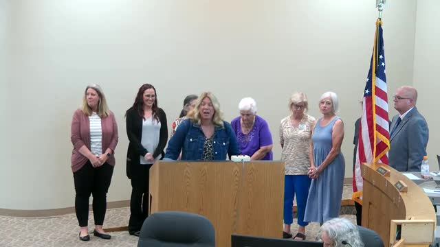 City of Derby presents donation to McConnell Air Force Base at BBQ festival