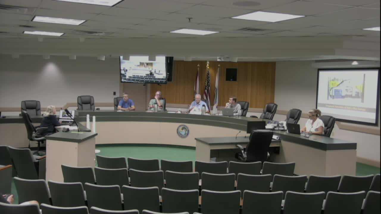 Flumion Board Reviews Garage Structure Proposal Amid Neighbor Support Concerns