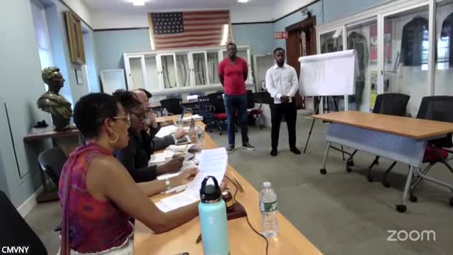 Two proposed two‑family houses on Millington Street adjourned; board asks for samples and zoning clarification