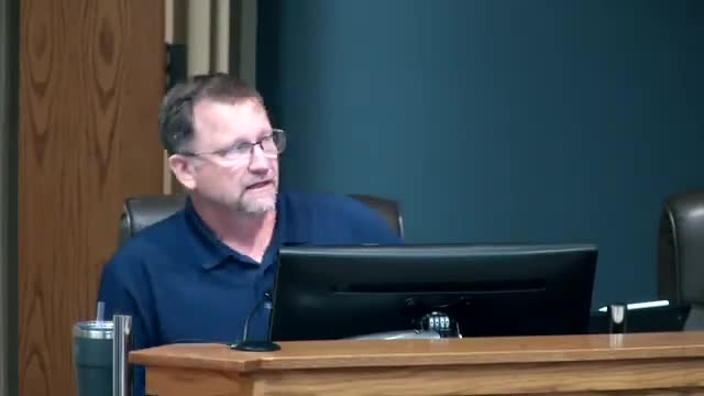 Resident Mark Topp Voices Concerns at Planning Board Meeting on Denver Avenue Development