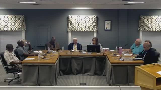Council Members Debate Employment Status of City Manager Roy Bam Haselow